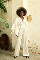 mono-alaia-blanco-largo-invitada-fluido-manga-larga-elegante